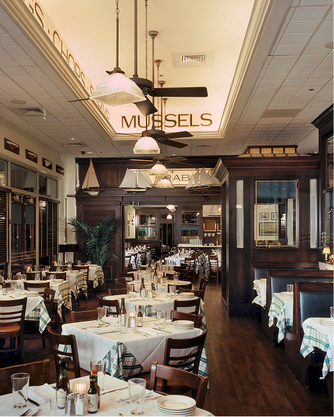 Main dining room at Hugo's in Naperville. Tables and booths set up ready to dine. Main dining room at Hugo's in Naperville. Tables and booths set up ready to dine.